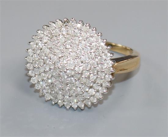 A modern 9ct gold and pave set diamond dress ring, (one stone missing), size V.